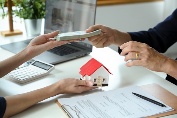 Vi phạm hợp đồng đặt cọc nhà đất phạt như thế nào?