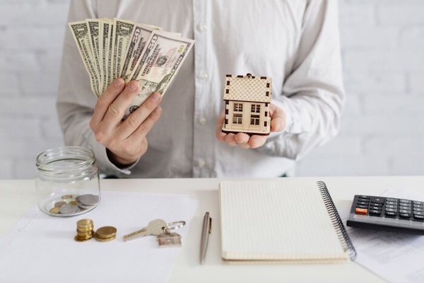 Đặt cọc mua nhà khi sổ đỏ đang ở ngân hàng thì phải làm gì?