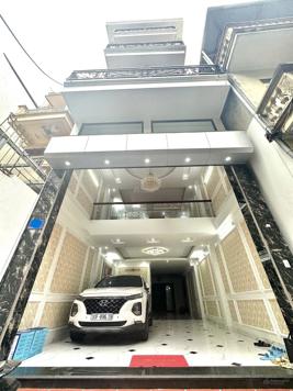 Bán nhà Hồ Tùng Mậu 65m2 giá 14.7 tỷ thang máy 6 tầng ô tô vào nhà