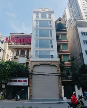 Cho thuê nhà mới xây xong phố Tô Vĩnh Diện - Lê Trọng Tấn DT: 100m2 x7T 1 hầm MT 6m giá 65tr/tr