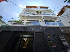 Nhà Phố Đường Quang Trung p8 Gò Vấp.DT:5x11 trệt 2 lầu sân thượng Gồm sân để xe. PK. Bếp,3PN,4WC