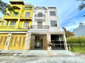 Nhà 1trệt 2lầu sân thượng-DT 7,3x11m-đường nhựa 6m - gần 3 trường đại học lớn-mới xây chưa sử dụng