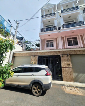 Chính chủ cần bán nhà đẹp 1 trệt 3 lầu gara ô tô, 3 sân thượng thoải mái diện tích sử dụng-83m2