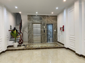 Nhà ngay MP Nguyễn Thị Định 6 tầng thang máy - MT cực rộng - Gara ô tô