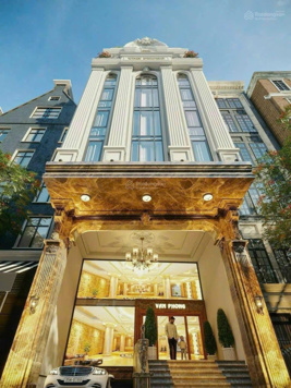 Bán gấp siêu phẩm tòa văn phòng mặt phố Hoàng Cầu view hồ DT 240m2 9T MT 9.5m kinh doanh 450tr/th