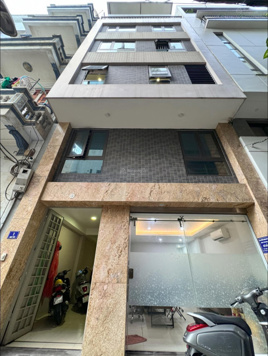 Hào Nam - 1 nhà ra phố - mặt tiền khủng - 7 tầng thang máy - ô tô - kinh doanh - 62m2 chỉ 19.x tỷ