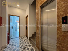 Nhà mới xây cho thuê dạng CHDV đầu tư full nội thất, có thang máy, bãi xe rộng quận Tân Bình