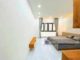 Bán nhà mới cứng ở ngay hẻm xe hơi đường Nơ Trang Long 4x16m trệt 2 lầu giá 9 tỷ