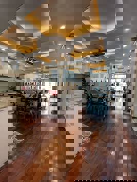 Bán nhà lô góc phố Tam Khương, Đống Đa, ô tô đỗ cửa TÒA CHUNG CƯ MINI 7 tầng 99m2 giá 31 tỷ