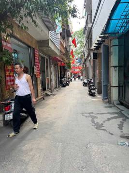 Phố Thái Thịnh, Đống Đa. Oto đỗ cửa, kinh doanh. Nhà 5 tầng x 32m, giá 6.4 tỷ