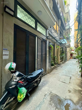 Mặt đường ô tô tránh - kinh doanh sầm uất phố Núi Trúc 58m2 * 5 tầng, gara 7 chỗ 15.8 tỷ