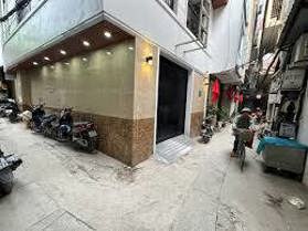 Bán nhà Ba Đình, ngay ô tô tránh có vỉa hè, tòa CHDV phố Văn Cao, lô góc, mới, 100m2*8T, MT 6m