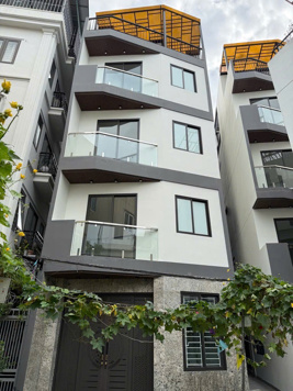 Bán nhà Nguyễn Khánh Toàn 64m2, 7T, MT 5.6m, phân lô, TM, gara, 19.6 tỷ