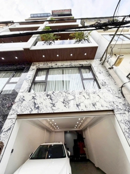 NHÀ ĐẸP ĐÓN TẾT- HỘ KHẨU TÂY HỒ- 6 TẦNG THANG MÁY- GARA OTO 7 CHỖ Ở NGAY- GẦN PHỐ 18.5 TỶ