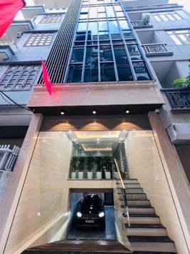 BÁN TÒA NHÀ ĐƯỜNG TRƯỜNG TRINH. 130M2 XÂY 9 TẦNG. THANG MÁY. GARA Ô TÔ.