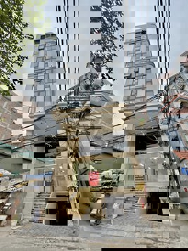 BÁN TÒA NHÀ MẶT PHỐ ĐẠI LINH. 100M2 XÂY 9 TẦNG. THANG MÁY. LÔ GÓC. 22 PHÒNG KHÉP KÍN.