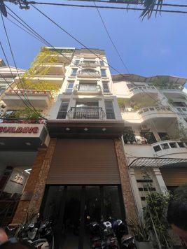 BÁN TÒA NHÀ PHỐ TRUNG KÍNH. CẦU GIẤY. 7 TẦNG. THANG MÁY. GARA Ô TÔ.