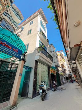 BÁN NHÀ MẶT NGÕ 211 ĐƯỜNG KHƯƠNG TRUNG. 100M2 - 4 TẦNG. GARA Ô TÔ.