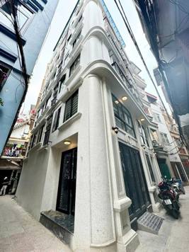 BÁN TÒA NHÀ CHDV ĐƯỜNG ĐỊNH CÔNG THƯỢNG. 7 TẦNG. THANG MÁY. LÔ GÓC. 21 CĂN HỘ.