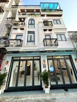 Bán nhà mới đẹp mặt tiền hẻm xe hơi Võ Thị Nhờ, Quận 7, 3 lầu. Giá 9,45 tỷ