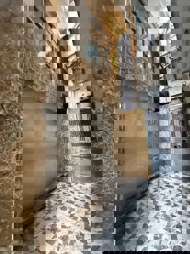 BÁN NHÀ ĐƯỜNG NGUYỄN VĂN TRỖI. 7 TẦNG. THANG MÁY. THÔNG SÀN