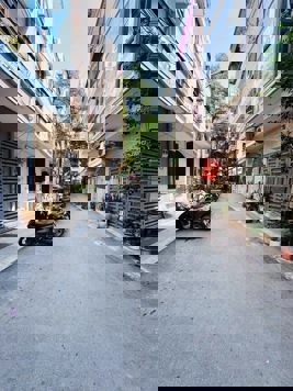 NHÀ PHỐ TRẦN QUANG DIỆU. 90M2 - 4 TẦNG. MT 9.7M. GARA Ô TÔ.