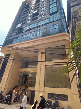 BÁN TÒA NHÀ ĐƯỜNG LÊ VĂN LƯƠNG. 110M2 - 9 TẦNG. THANG MÁY. LÔ GÓC. MT 12.6M.