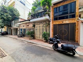 BÁN NHÀ ĐƯỜNG HOÀNG ĐẠO THÀNH. 8 TẦNG. THANG MÁY. THÔNG SÀN. GARA Ô TÔ.